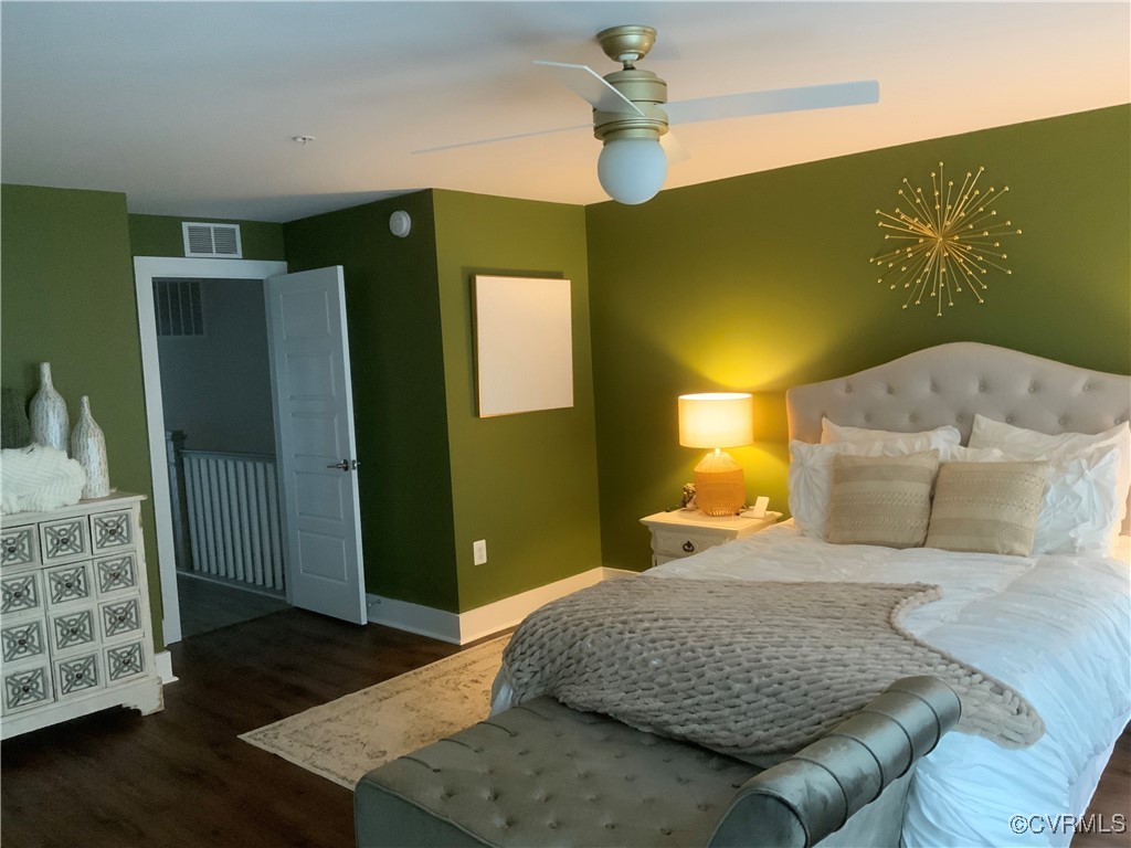 4324 Saunders Station Loop, Unit A Henrico, VA 23233 - Photo 17 of 30 a bedroom with a bed and a dresser