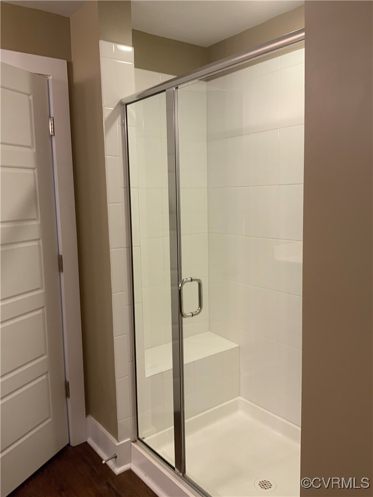 4324 Saunders Station Loop, Unit A Henrico, VA 23233 - Photo 21 of 30 a bathroom with a glass shower door