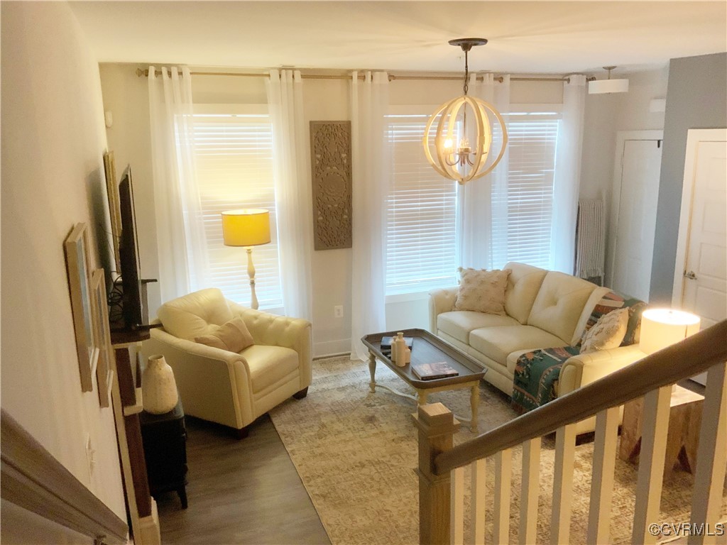 4324 Saunders Station Loop, Unit A Henrico, VA 23233 - Photo 9 of 30 a living room with furniture mirror and a table