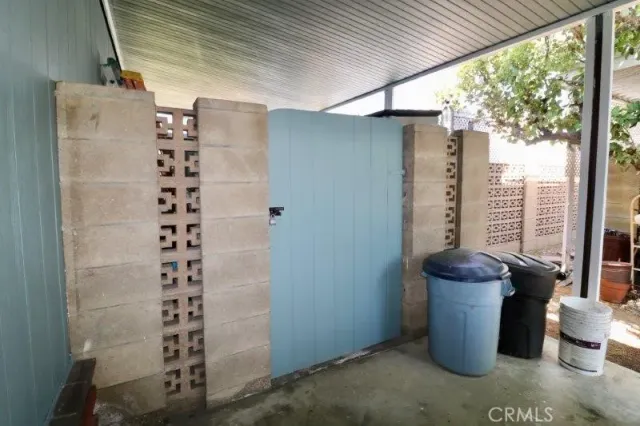 a view of a livingroom with furniture and a flat screen tv