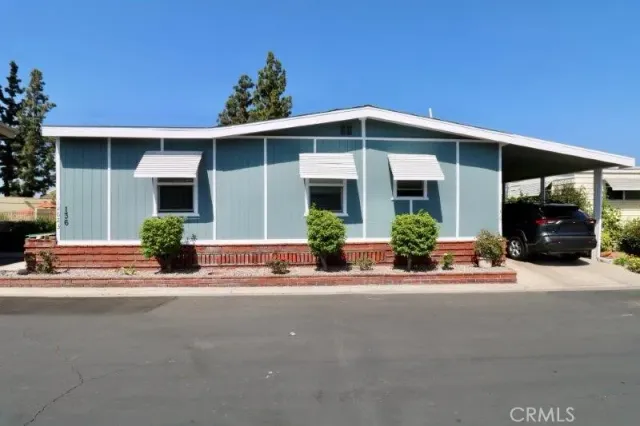 front view of a house with a patio