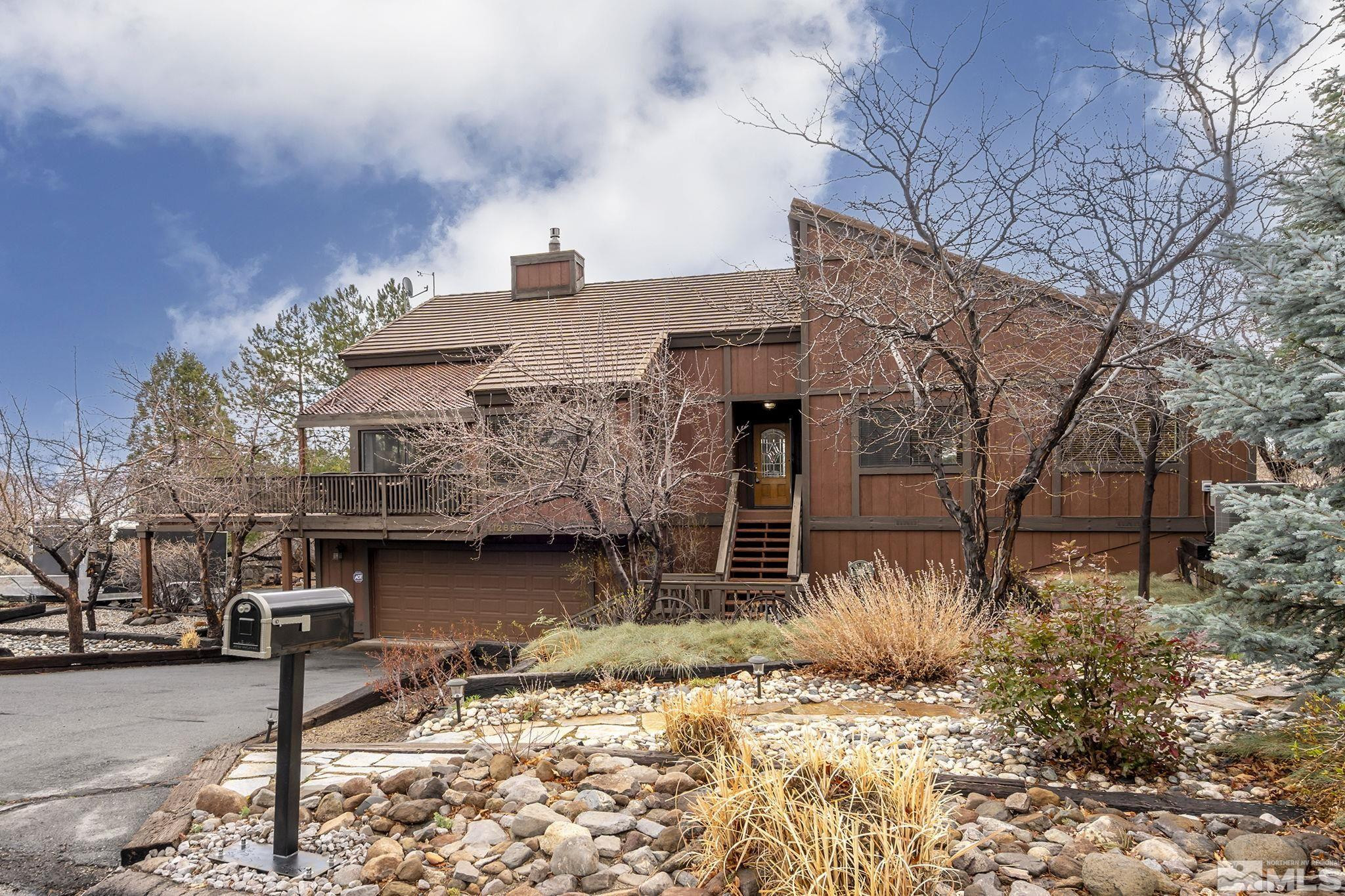 12880 Roseview Lane Reno, NV 89511 - Photo 3 of 34 a view of a house with a patio