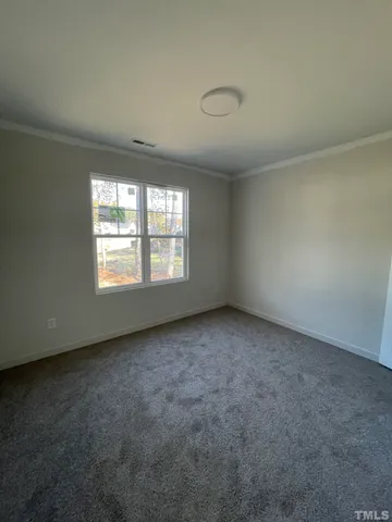 a view of a backyard of the house