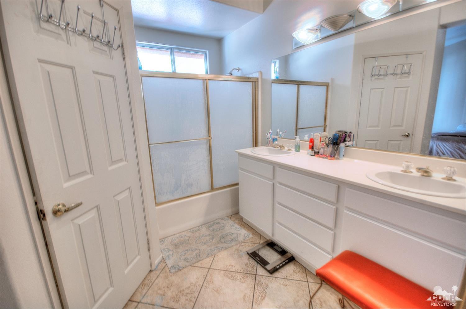 68237 Pasada Road Cathedral City, CA 92234 - Photo 15 of 30 a bathroom with a sink and mirror