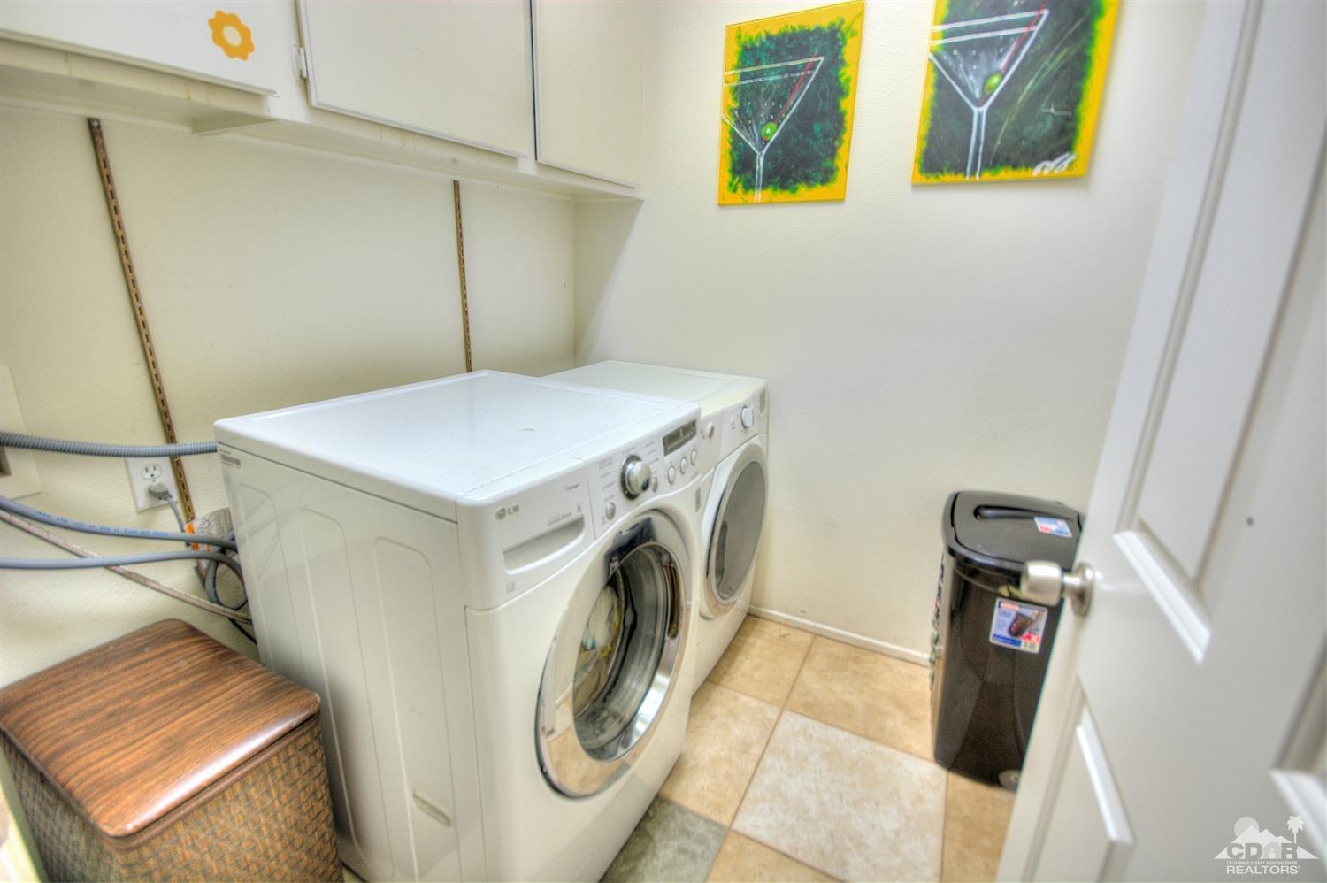 68237 Pasada Road Cathedral City, CA 92234 - Photo 21 of 30 a utility room with dryer and washer