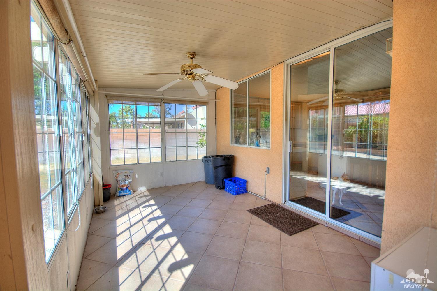 68237 Pasada Road Cathedral City, CA 92234 - Photo 23 of 30 a bed room with a bed and a window