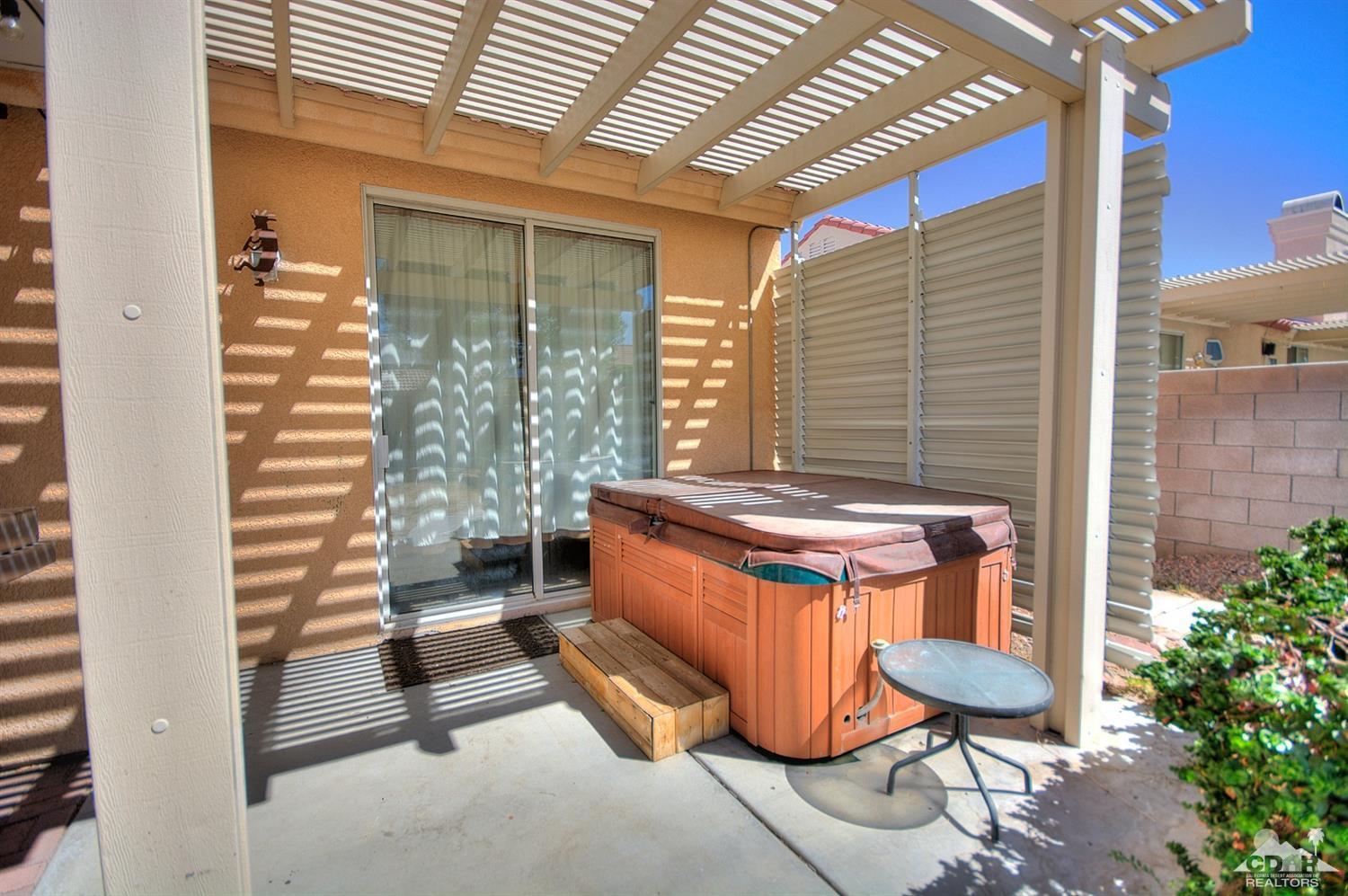 68237 Pasada Road Cathedral City, CA 92234 - Photo 27 of 30 a backyard of a house with outdoor seating