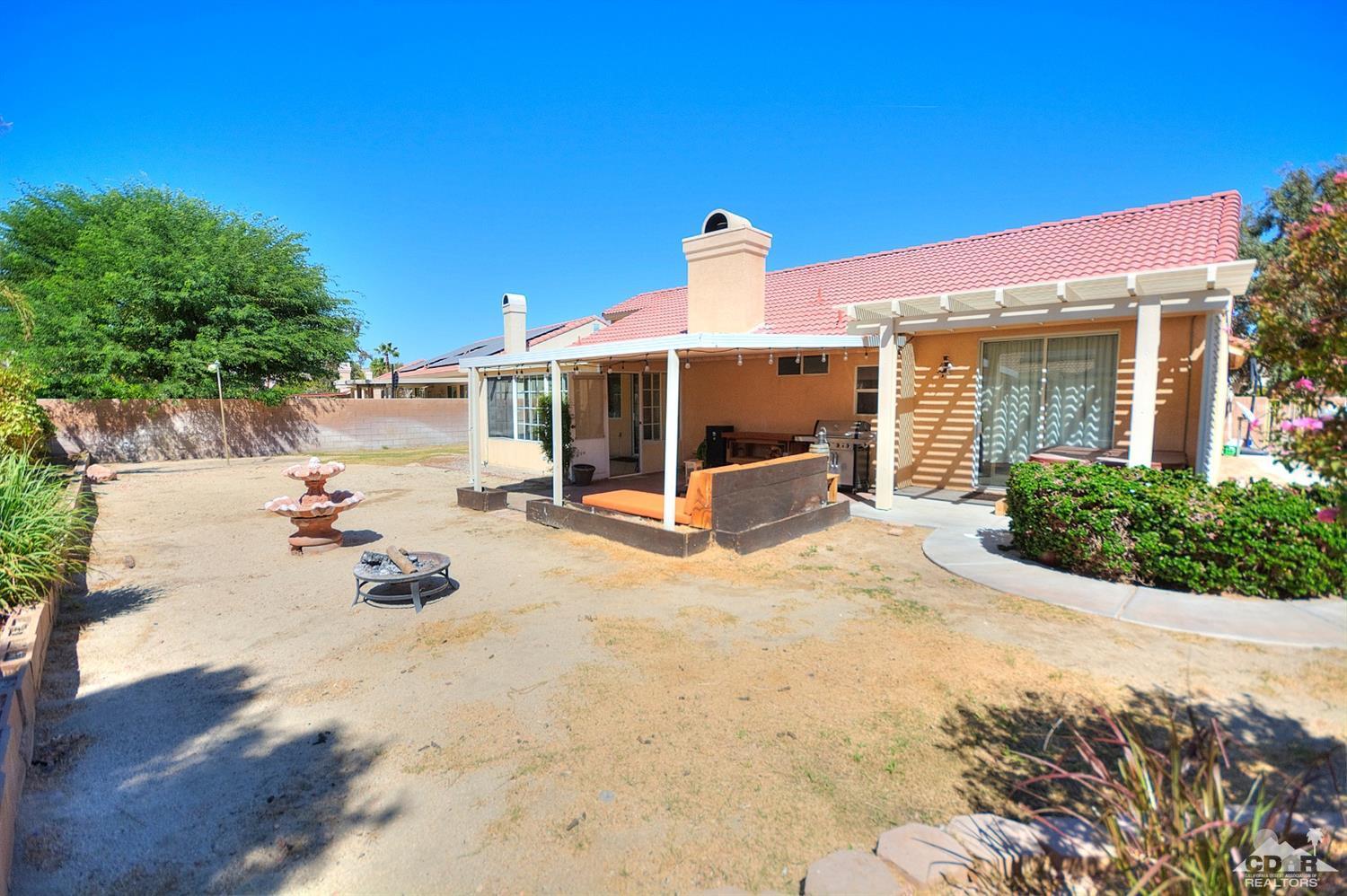 68237 Pasada Road Cathedral City, CA 92234 - Photo 28 of 30 a view of a house with backyard and sitting area