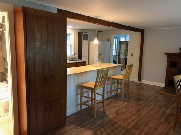211 South Row Road Lunenburg, MA 01462 - Photo 11 of 19 a view of a dining room with furniture and wooden floor