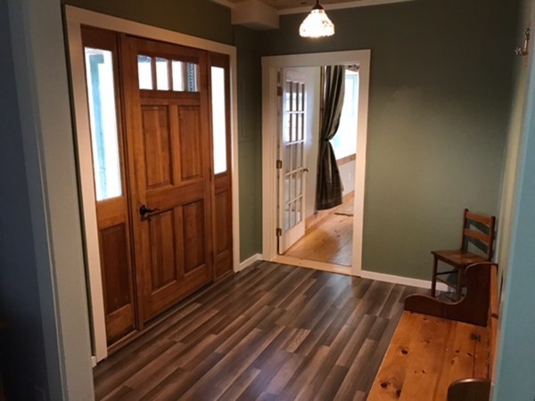 211 South Row Road Lunenburg, MA 01462 - Photo 3 of 19 a view of a hallway with wooden floor and staircase