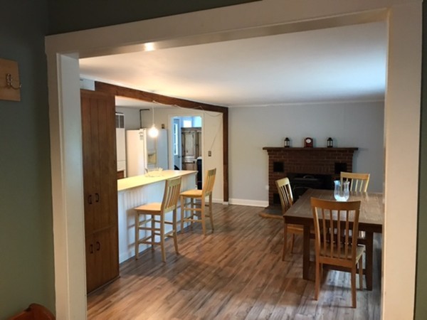 211 South Row Road Lunenburg, MA 01462 - Photo 4 of 19 a view of a dining room with furniture and wooden floor