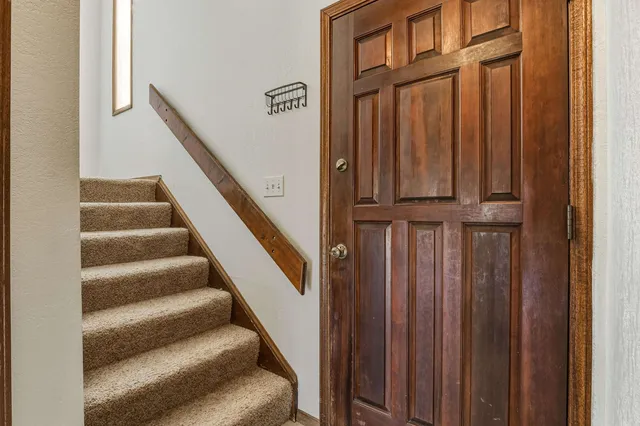 a view of entryway with wooden floor