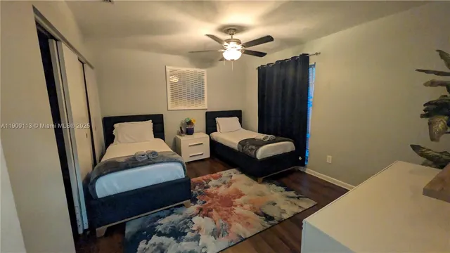 a bathroom with a shower and a sink