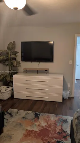 a bed room with a bed and a window