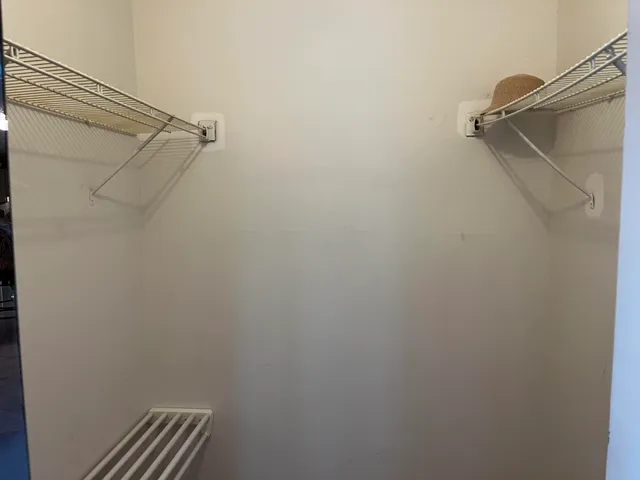 a living room with furniture chandelier and a chandelier