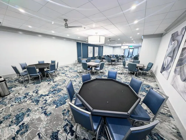 a view of a park with large trees