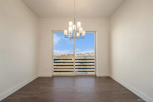 a bathroom with a tub a toilet and a sink