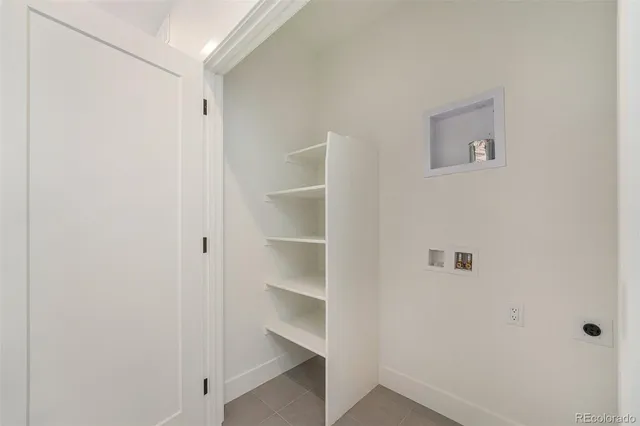 a view of outdoor space with wooden floor and city view