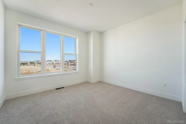 a view of a city with tall buildings