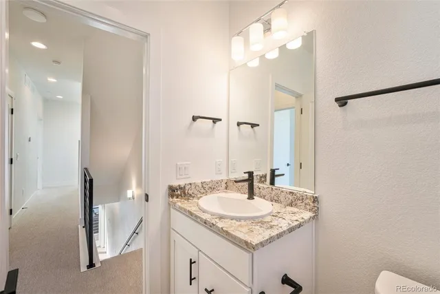 a front view of a building with many windows