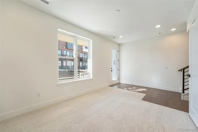 a kitchen with stainless steel appliances granite countertop a sink and a stove top oven