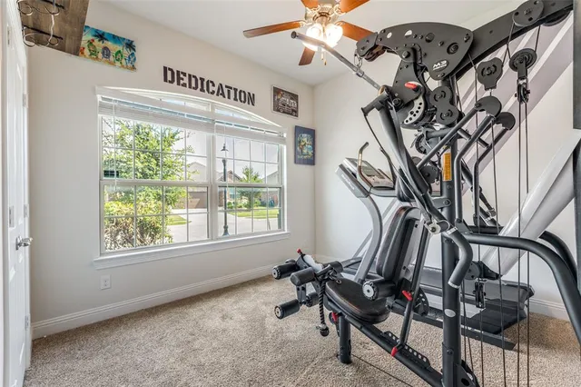 a view of a room with gym equipment
