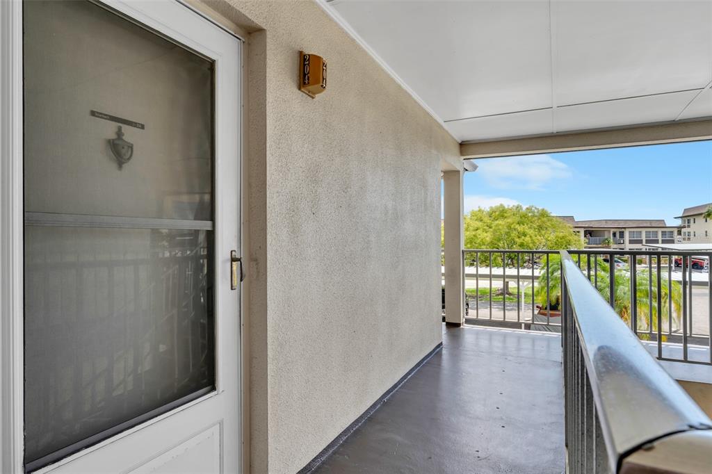 4743 Jasper Drive, Unit 204 New Port Richey, FL 34652 - Photo 3 of 17 a view of balcony