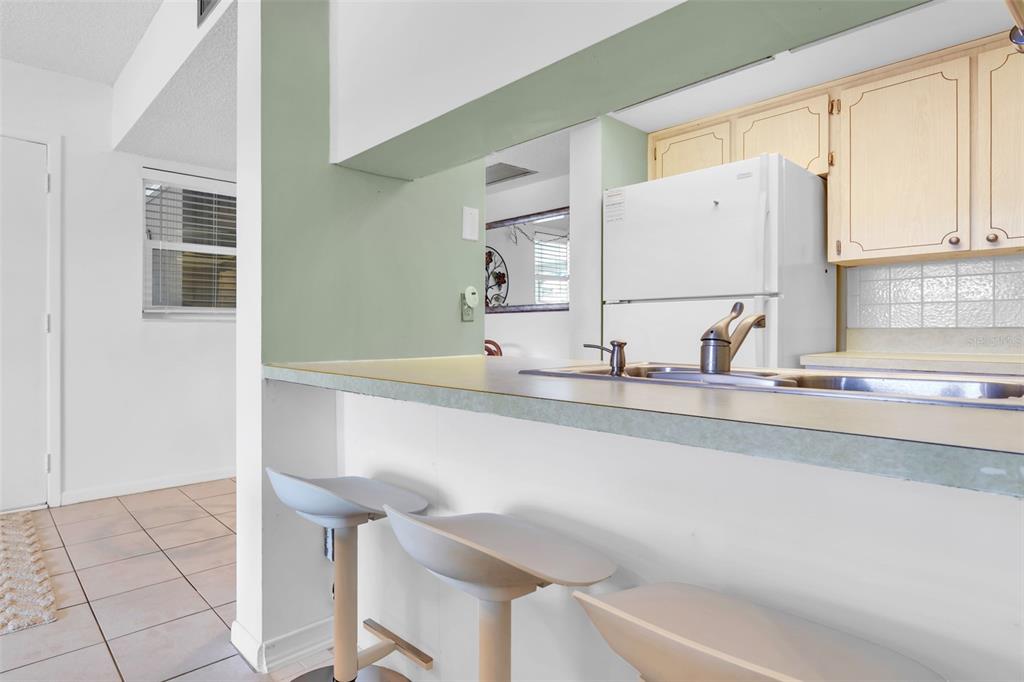 4743 Jasper Drive, Unit 204 New Port Richey, FL 34652 - Photo 8 of 17 a bathroom with a sink and a mirror