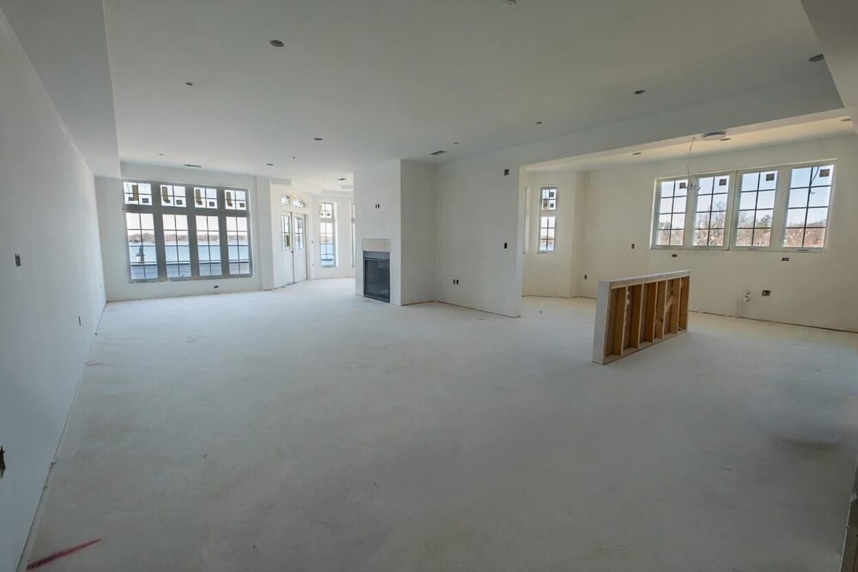 503 North Lake Road, Unit 1 Oconomowoc, WI 53066 - Photo 7 of 20 Unfinished Great Room