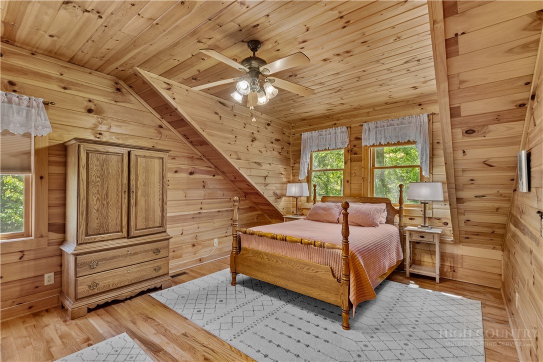 339 Welcome Way Boone, NC 28607 - Photo 16 of 20 a bed room with a bed and a window