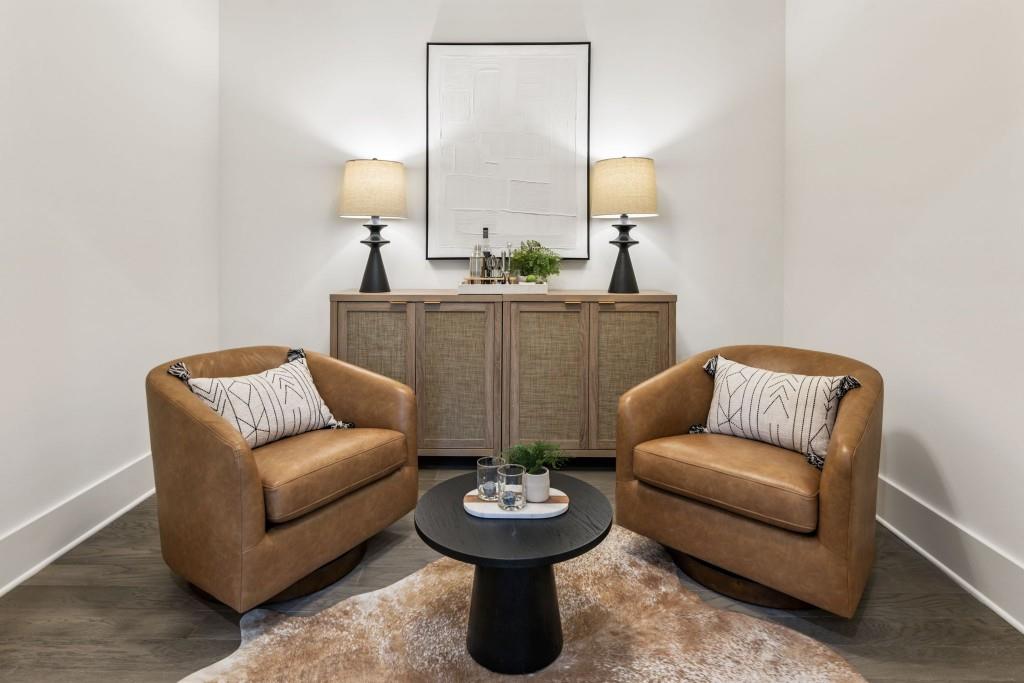 12455 Broadwell Road, Unit 201 Milton, GA 30004 - Photo 14 of 38 a living room with furniture and lamp