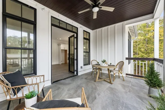 a dining room with furniture and window
