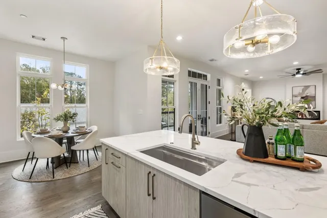 a kitchen with a table and chairs