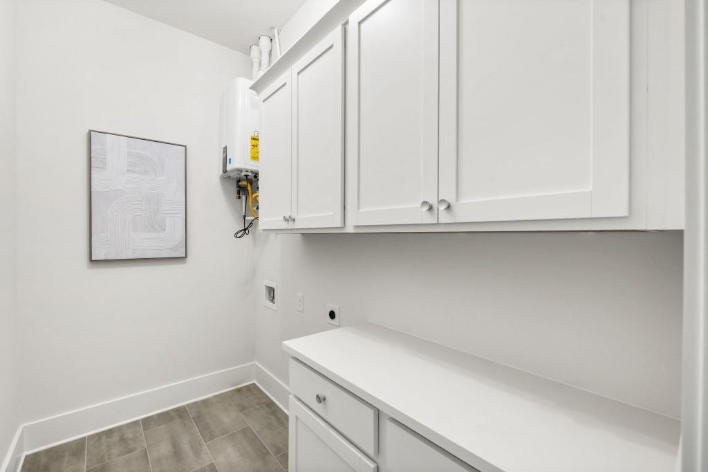 12455 Broadwell Road, Unit 201 Milton, GA 30004 - Photo 27 of 38 a utility room with a sink