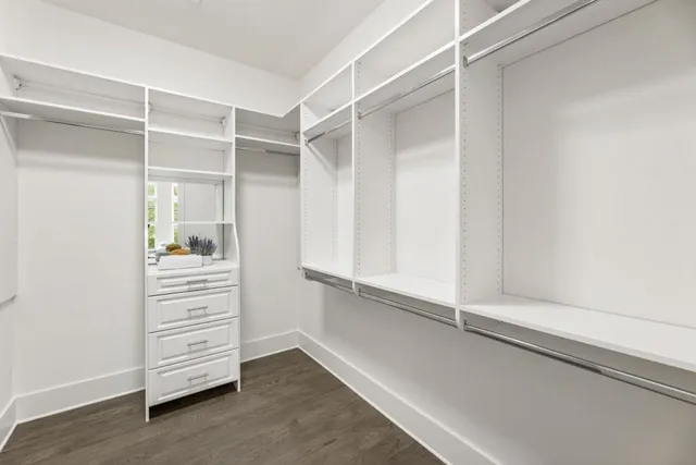 a view of an empty walk in closet