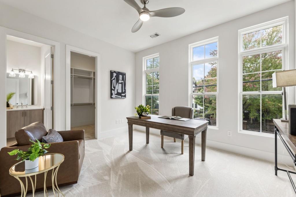 12455 Broadwell Road, Unit 201 Milton, GA 30004 - Photo 33 of 38 a view of a workspace with furniture and a window