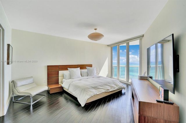 a view of a two chair in the balcony