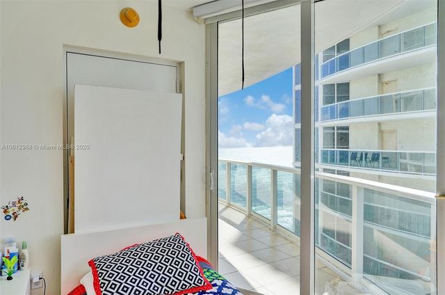 a view of swimming pool with a bathtub
