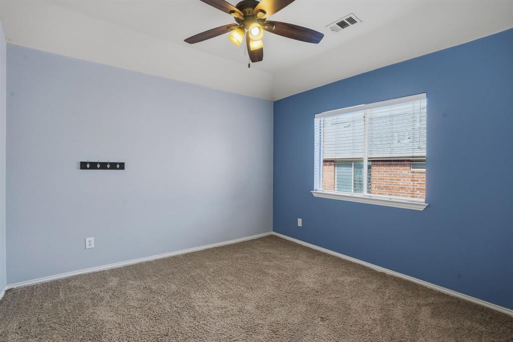 5913 Independence Court Rowlett, TX 75089 - Photo 16 of 27 a view of an empty room with a window