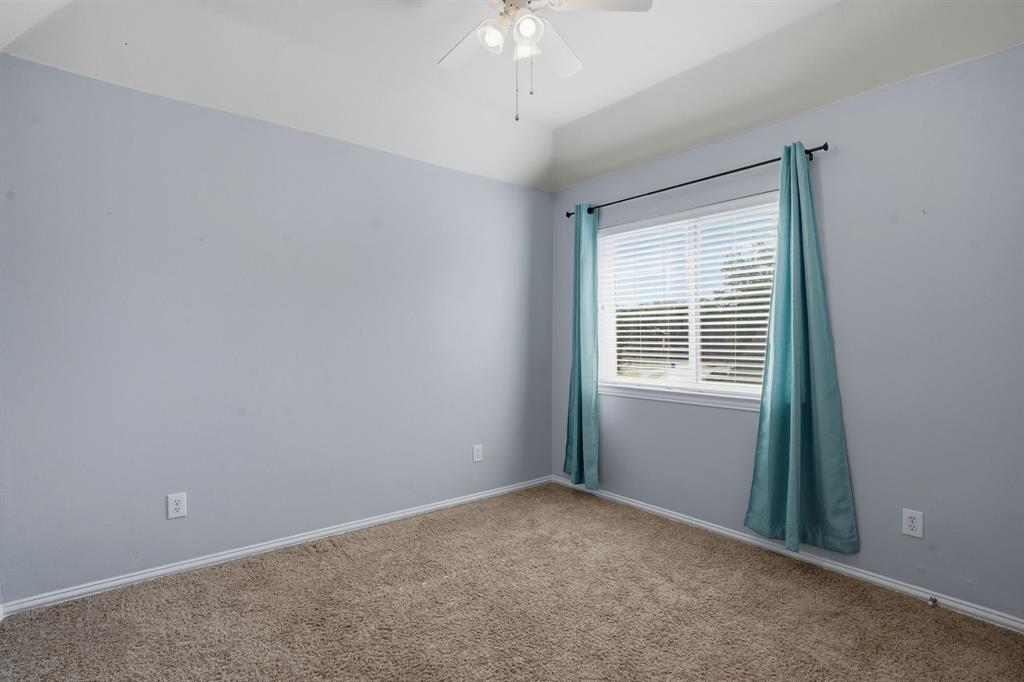 5913 Independence Court Rowlett, TX 75089 - Photo 18 of 27 an empty room with a window