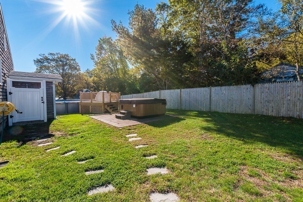 14 Wenonah Road Wareham, MA 02532 - Photo 36 of 40 a backyard of a house with yard and outdoor seating