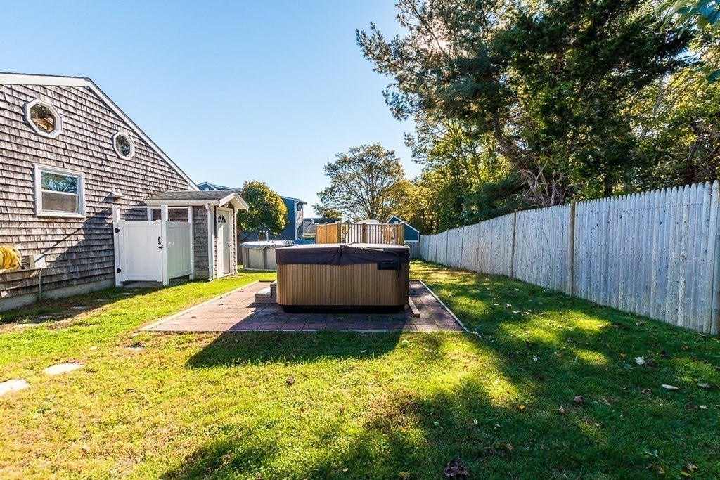 14 Wenonah Road Wareham, MA 02532 - Photo 38 of 40 a view of a backyard with a small cabin