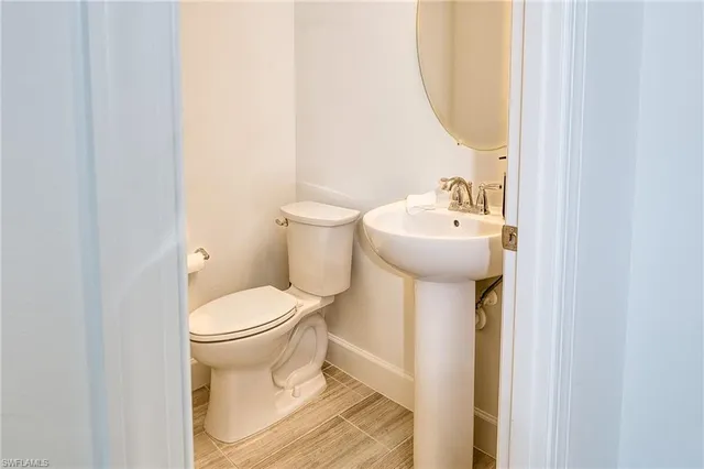 a view of a hallway view with staircase