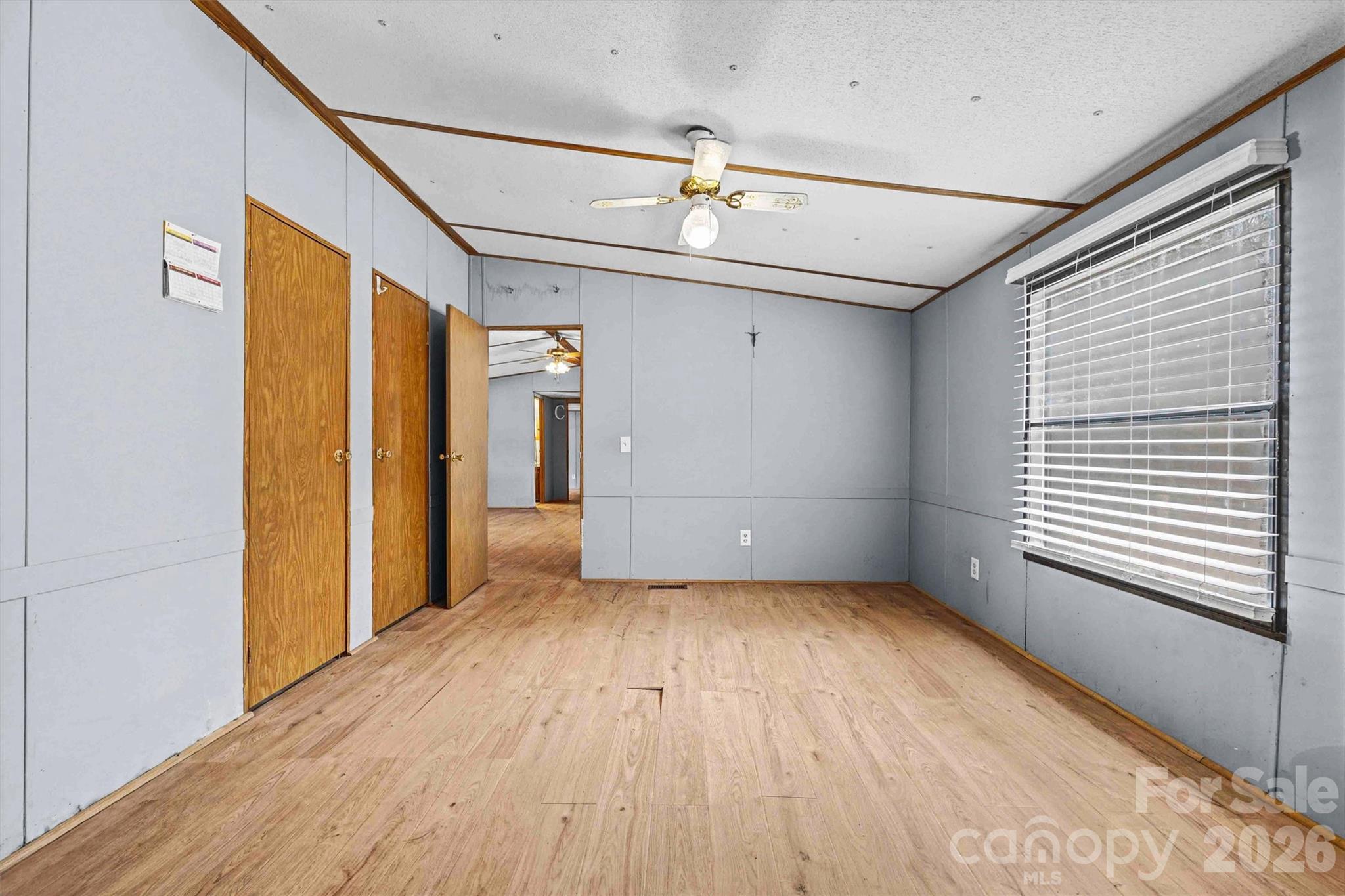 1612 Honeysuckle Pond Road Rock Hill, SC 29732 - Photo 12 of 26 a view of a room with wooden floor and natural light