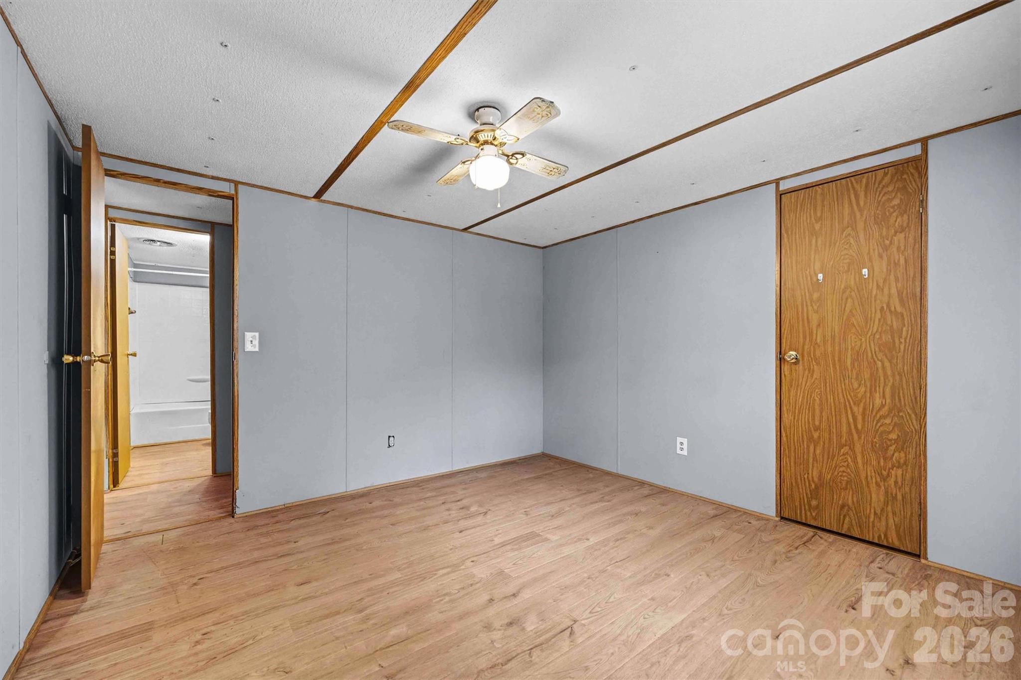 1612 Honeysuckle Pond Road Rock Hill, SC 29732 - Photo 16 of 26 wooden floor in an empty room with a window