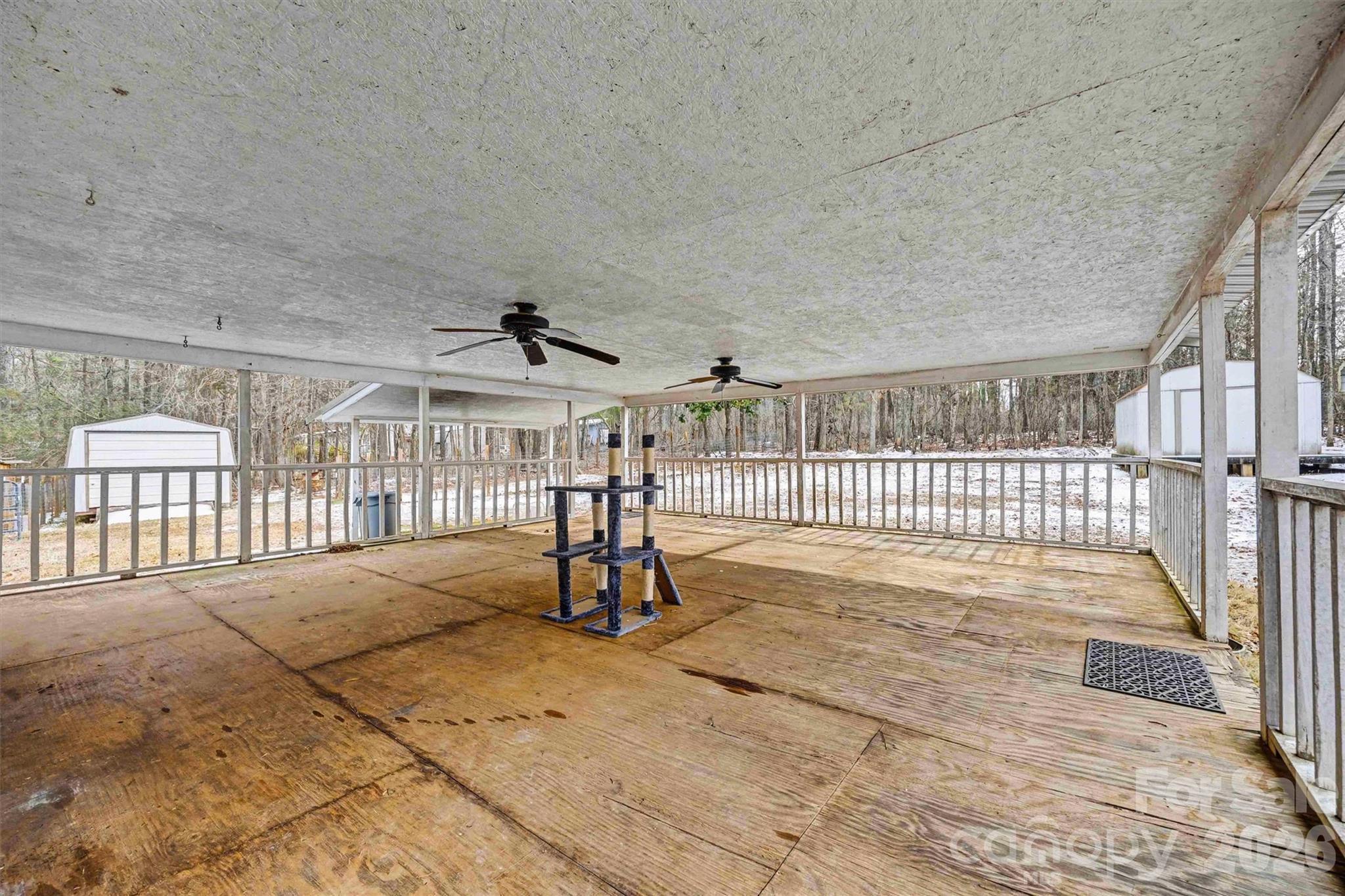 1612 Honeysuckle Pond Road Rock Hill, SC 29732 - Photo 20 of 26 a view of a porch with wooden floor