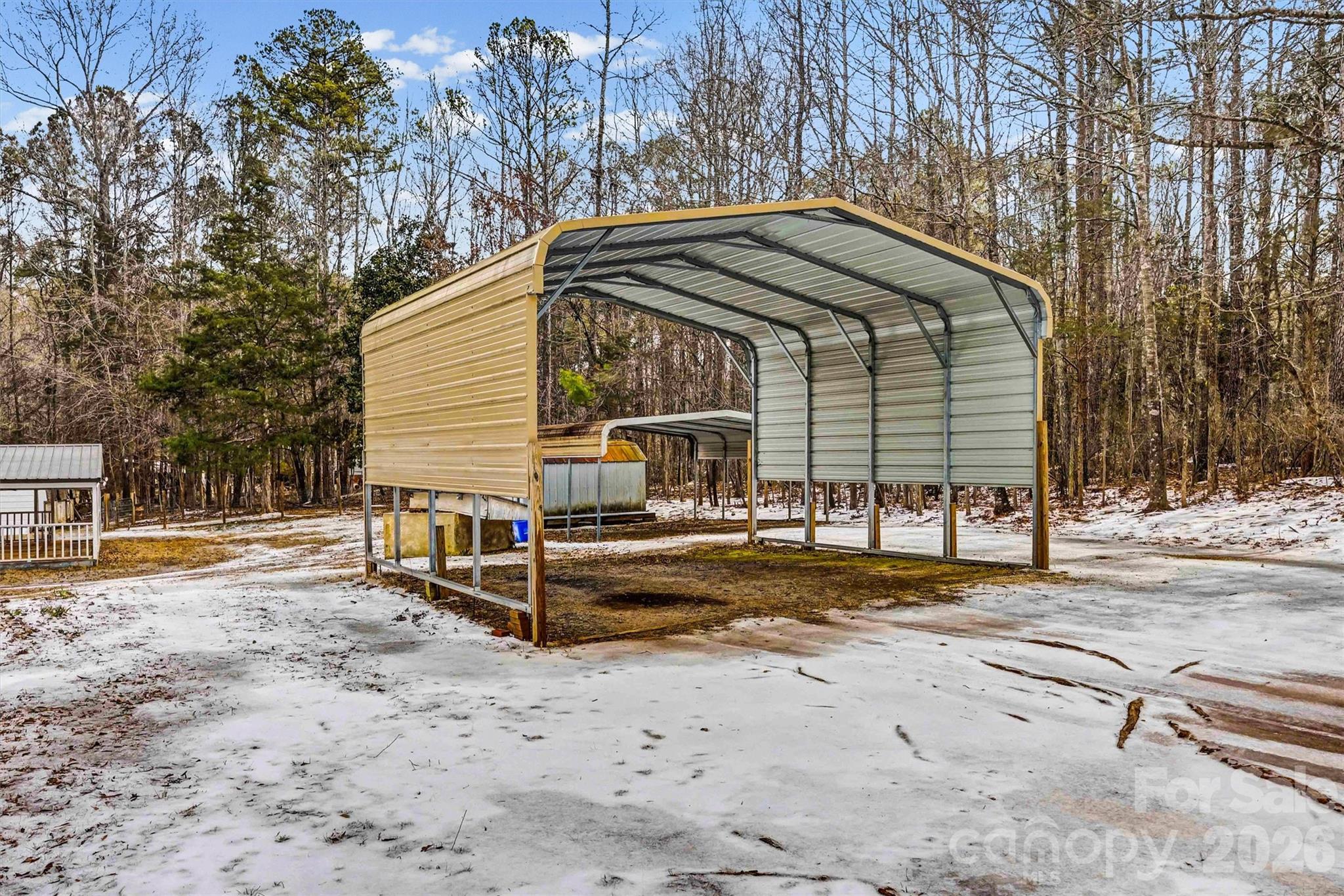 1612 Honeysuckle Pond Road Rock Hill, SC 29732 - Photo 24 of 26 a view of a house with backyard and trees