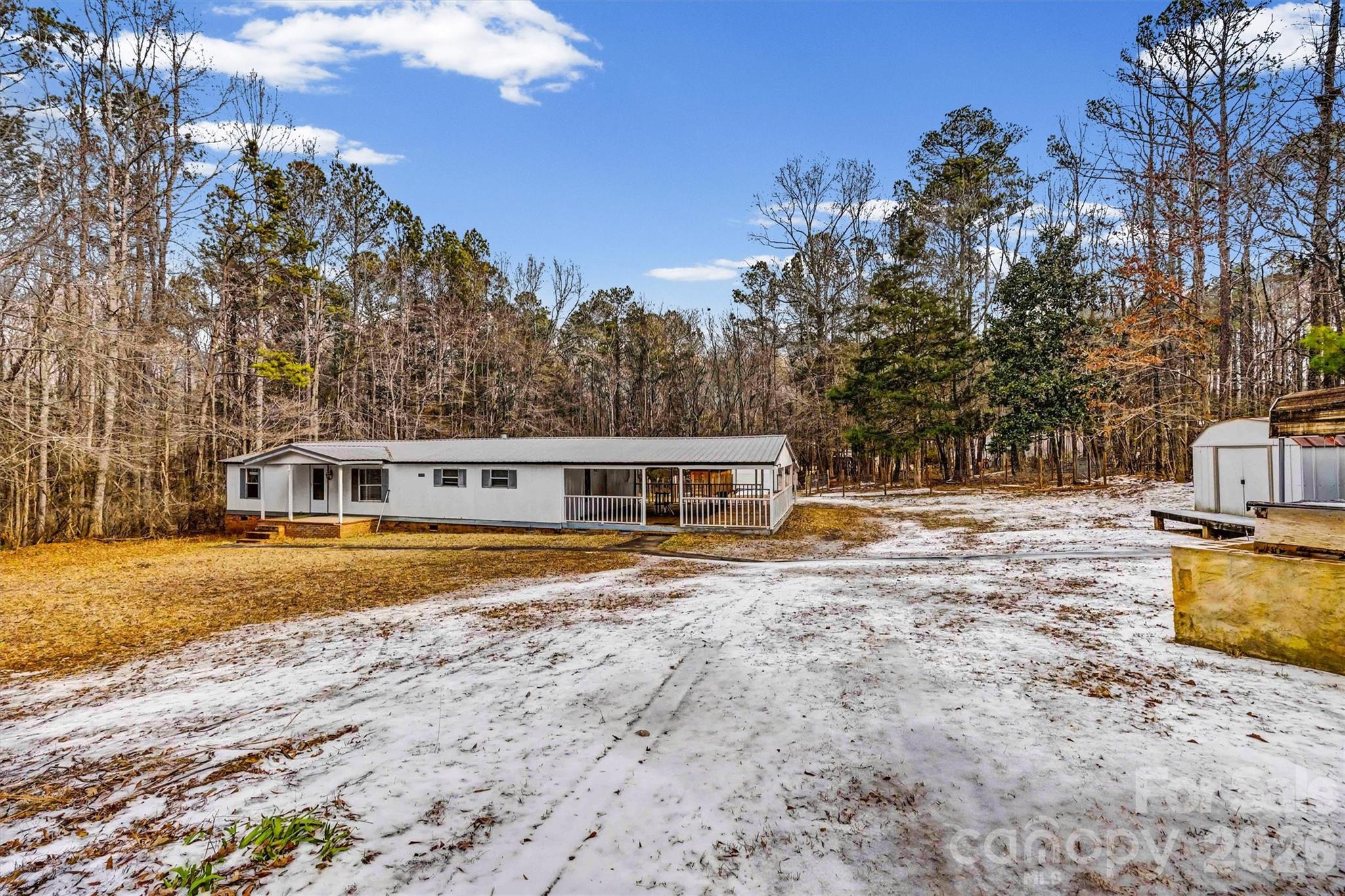 1612 Honeysuckle Pond Road Rock Hill, SC 29732 - Photo 26 of 26 a view of a house with backyard space and balcony
