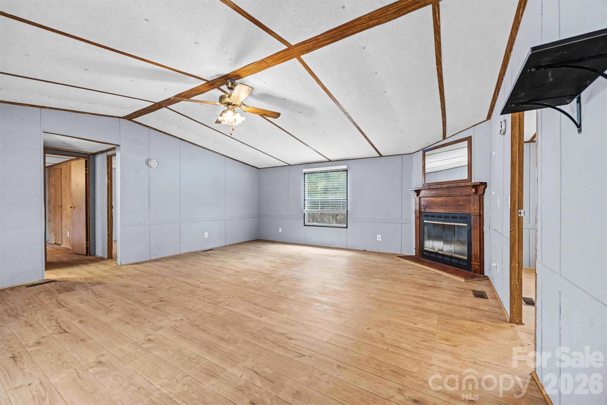 1612 Honeysuckle Pond Road Rock Hill, SC 29732 - Photo 4 of 26 a view of an empty room with a fireplace