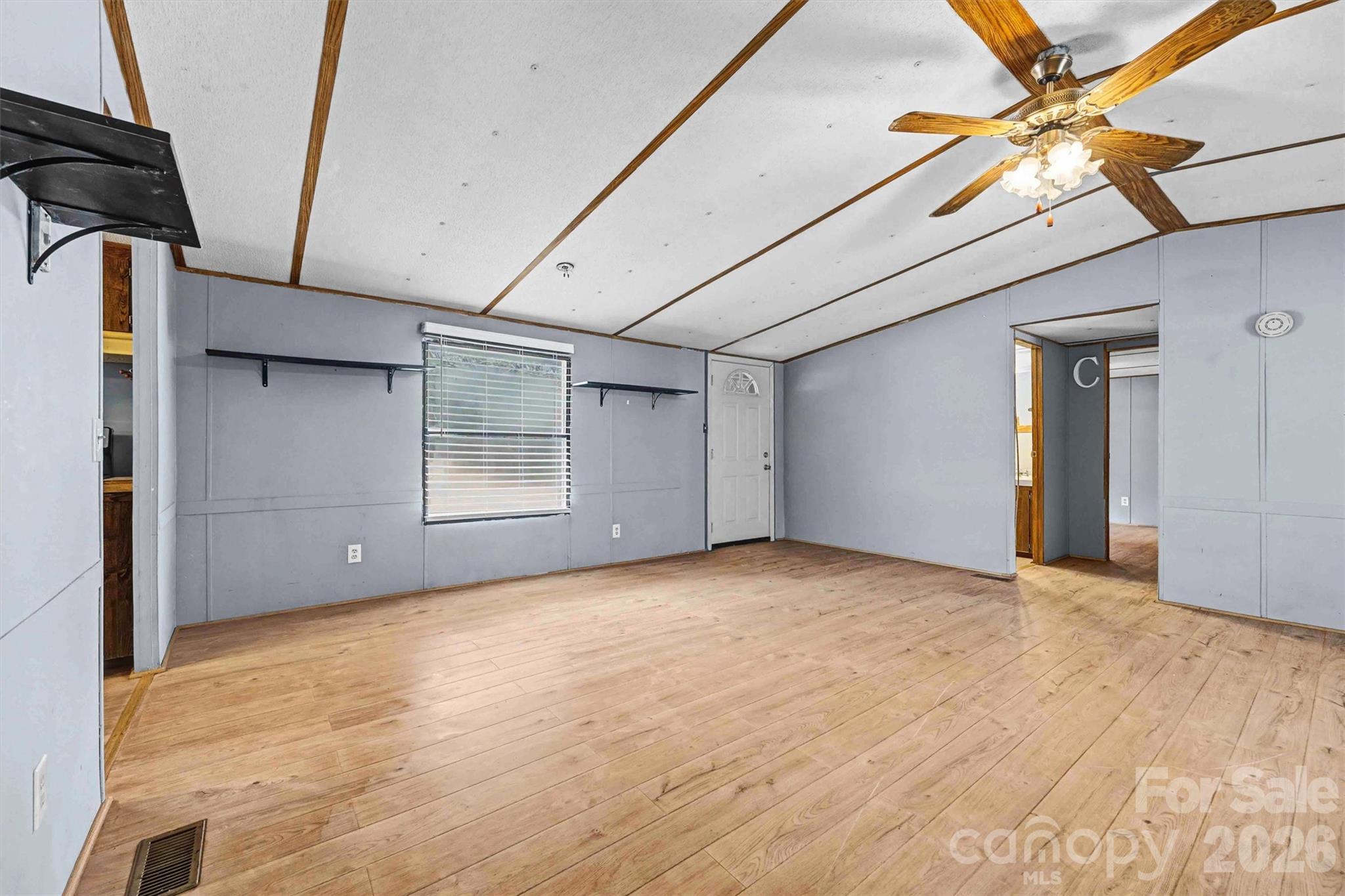 1612 Honeysuckle Pond Road Rock Hill, SC 29732 - Photo 6 of 26 a view of an empty room with a window